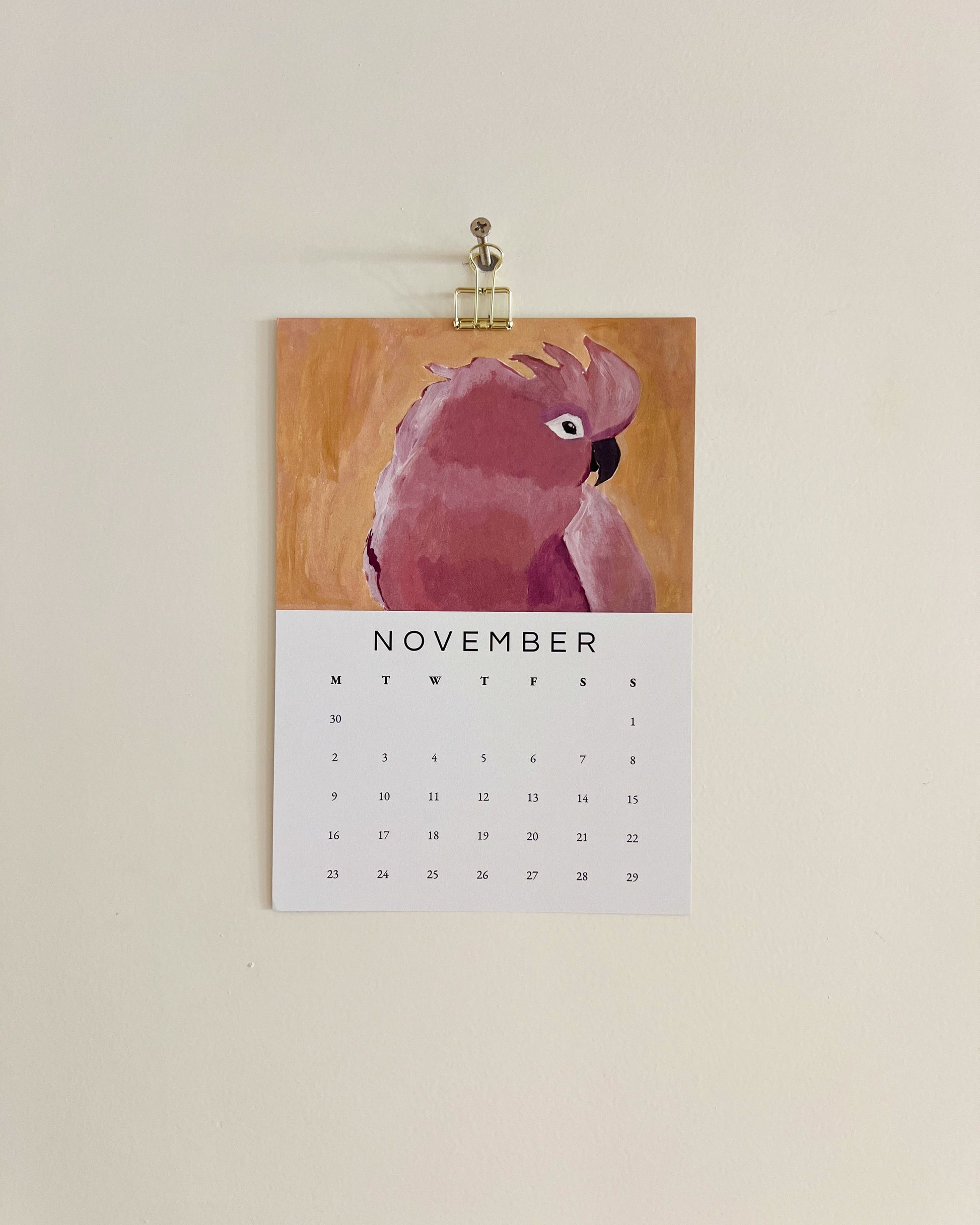 2026 Wall/Desk Calendar with November sketchbook original art/illustration of a pink cockatoo on a beige wall