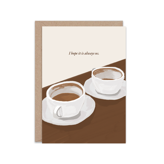 Greeting card with two coffee cups and a quote on a brown and beige background